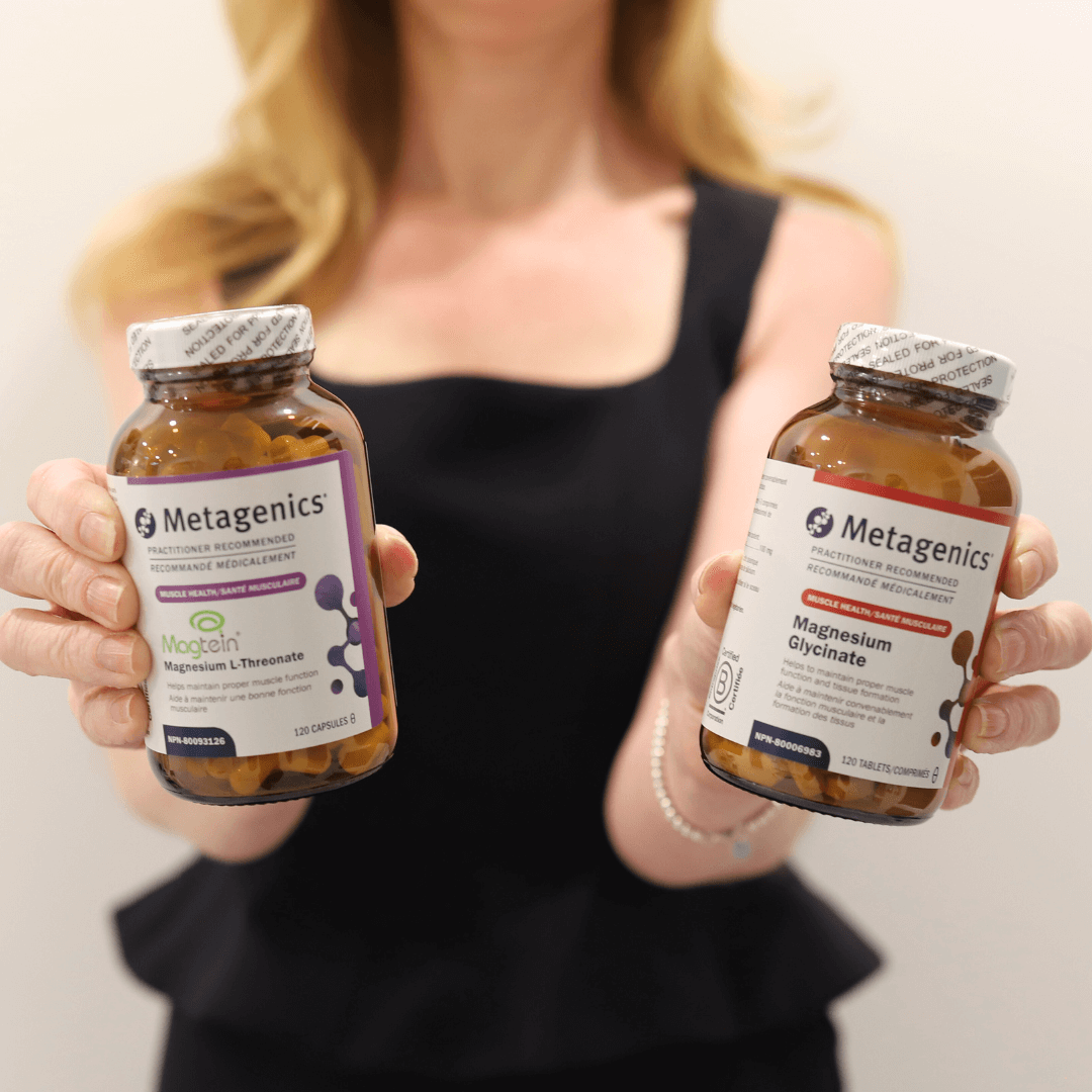 woman holding magnesium supplements Vitality at GLO